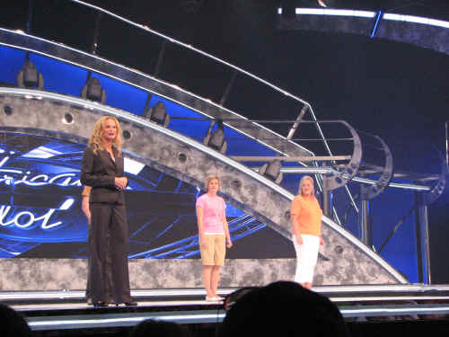 The hostess with three contestants